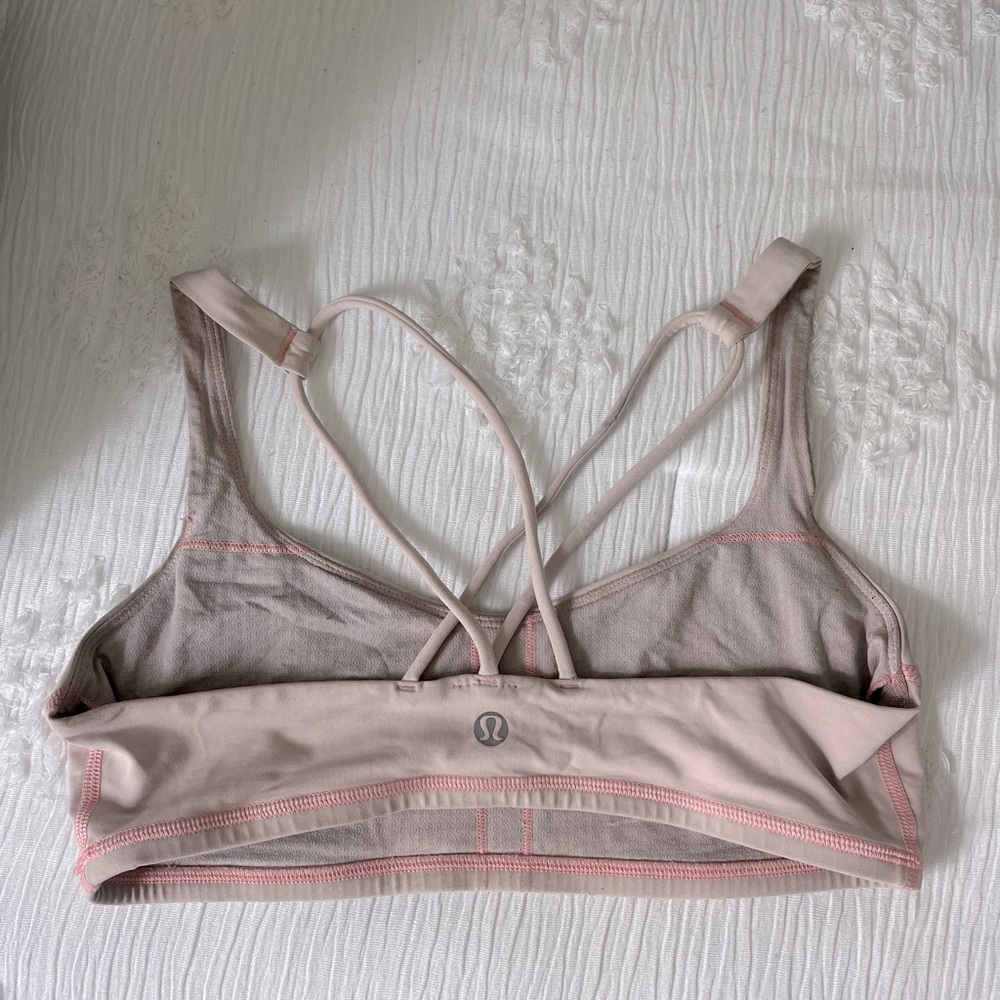 Light pink lululemon bra(size 4 I believe)